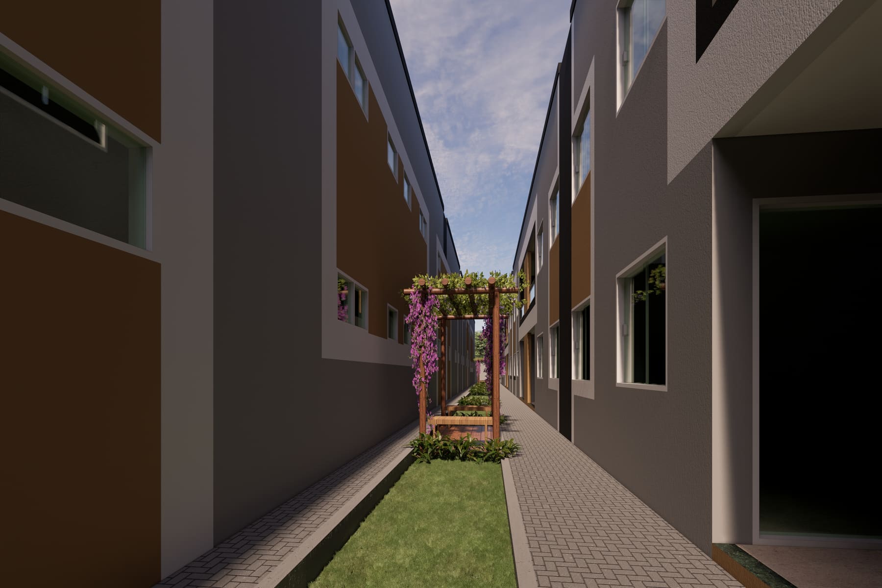 Corredor interno entre os blocos com jardim